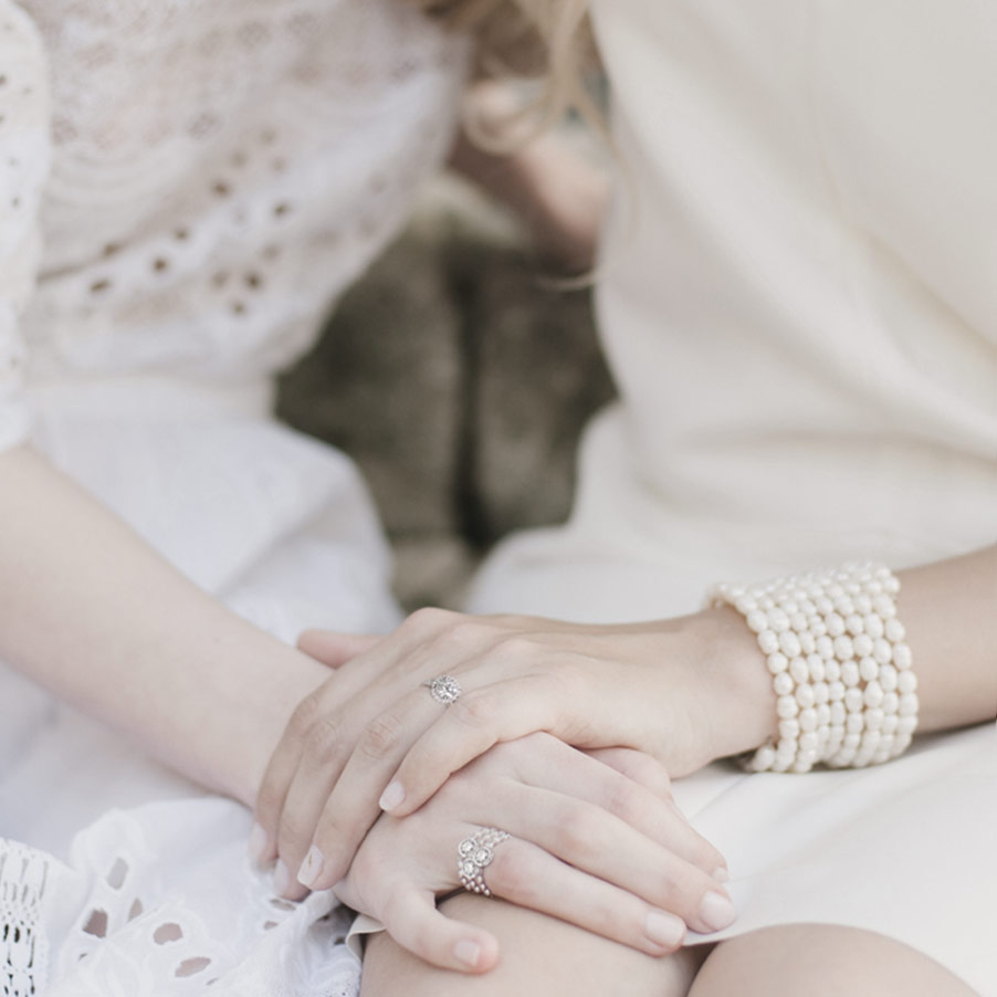 Beautiful Hands With Wedding Rings Of The Newlyweds On A Bouquet Stock  Photo - Download Image Now - iStock